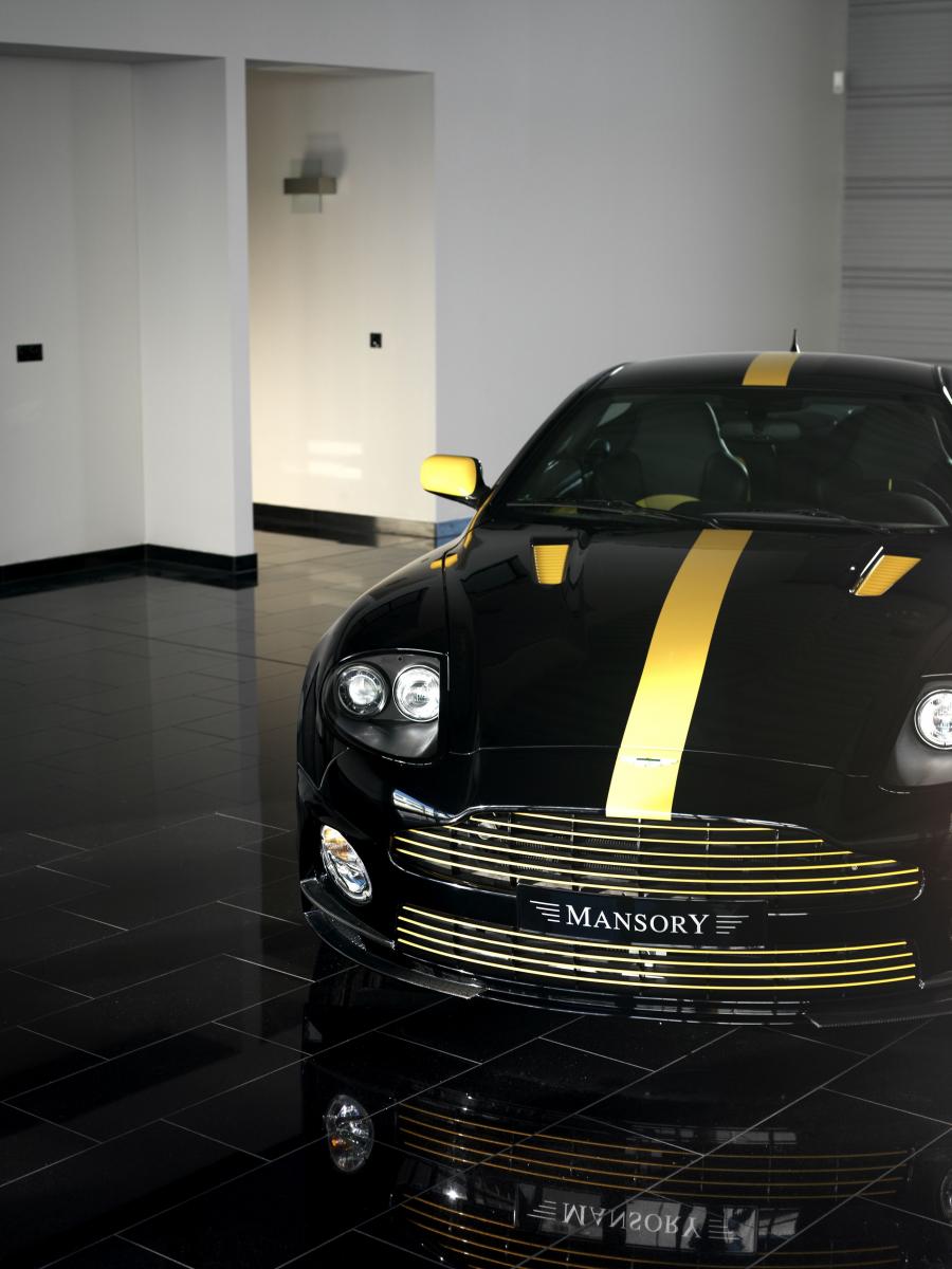  Aston Martin Vanquish S by Mansory 2005 года  (фото 6 из 12)